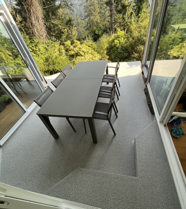Vinyl Decking - A wrapped step in 66-Mill Grey Marble Armor Deck - West Vancouver - 2