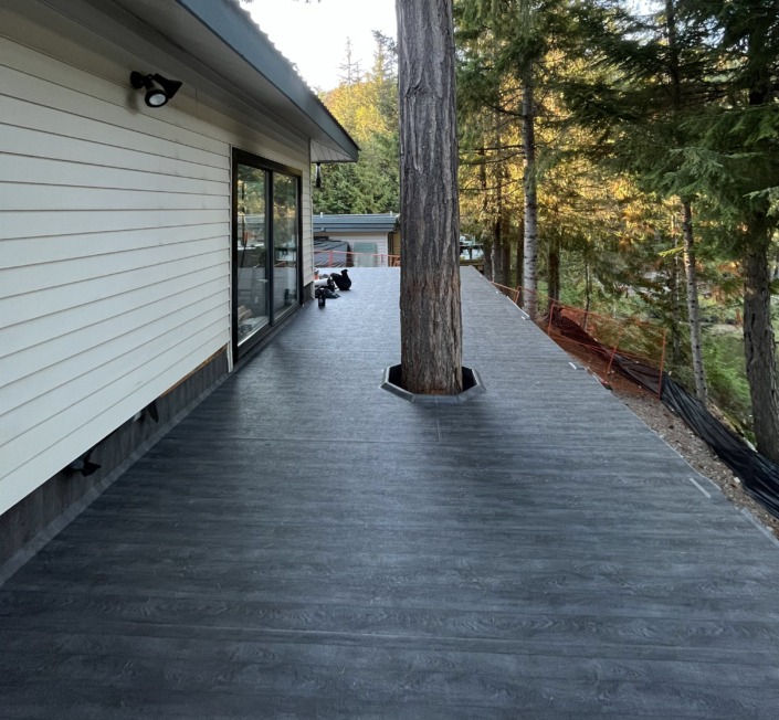 66 Mil Mahogany Plank Armor Deck Installation - Tamarisk Clubhouse - Whistler