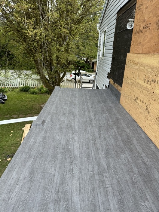 Vinyl Decking Installation - 66 Mil Grey Pearl Plank Armor Deck with a Wrapped Pedestal Post Block - Squamish